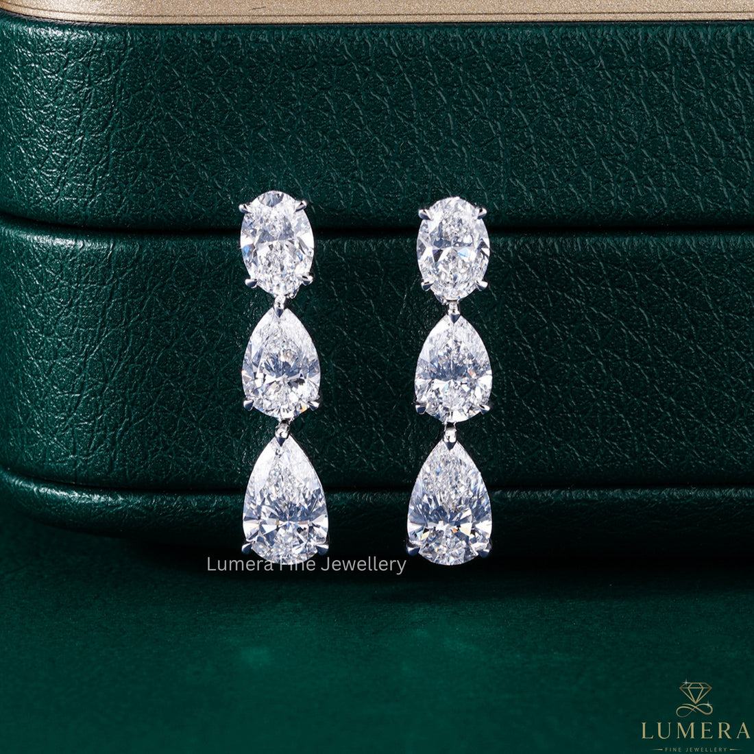 4.80 TCW Pear and Oval Cut Lab Grown Diamond Dangle Earrings