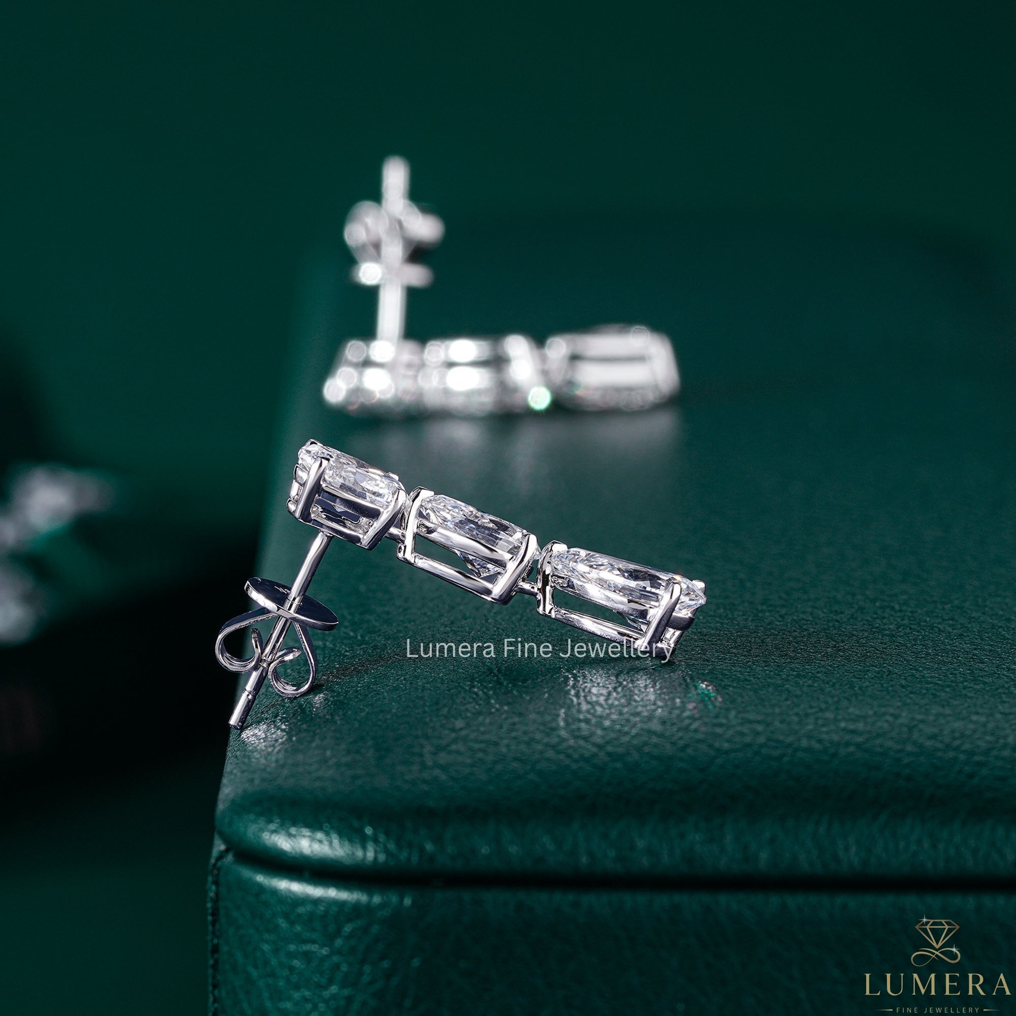 4.80 TCW Pear and Oval Cut Lab Grown Diamond Dangle Earrings