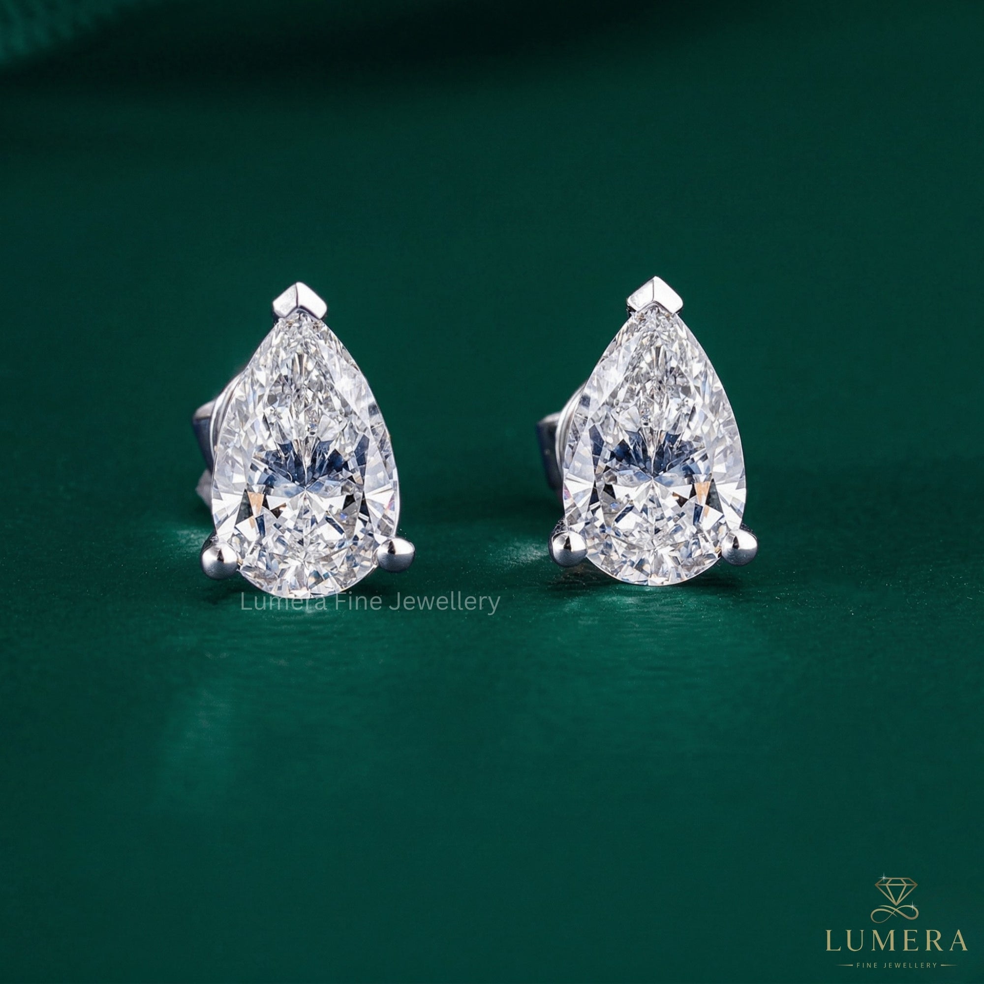 2.40 TCW Pear Cut Lab Grown Diamond Stud Earrings
