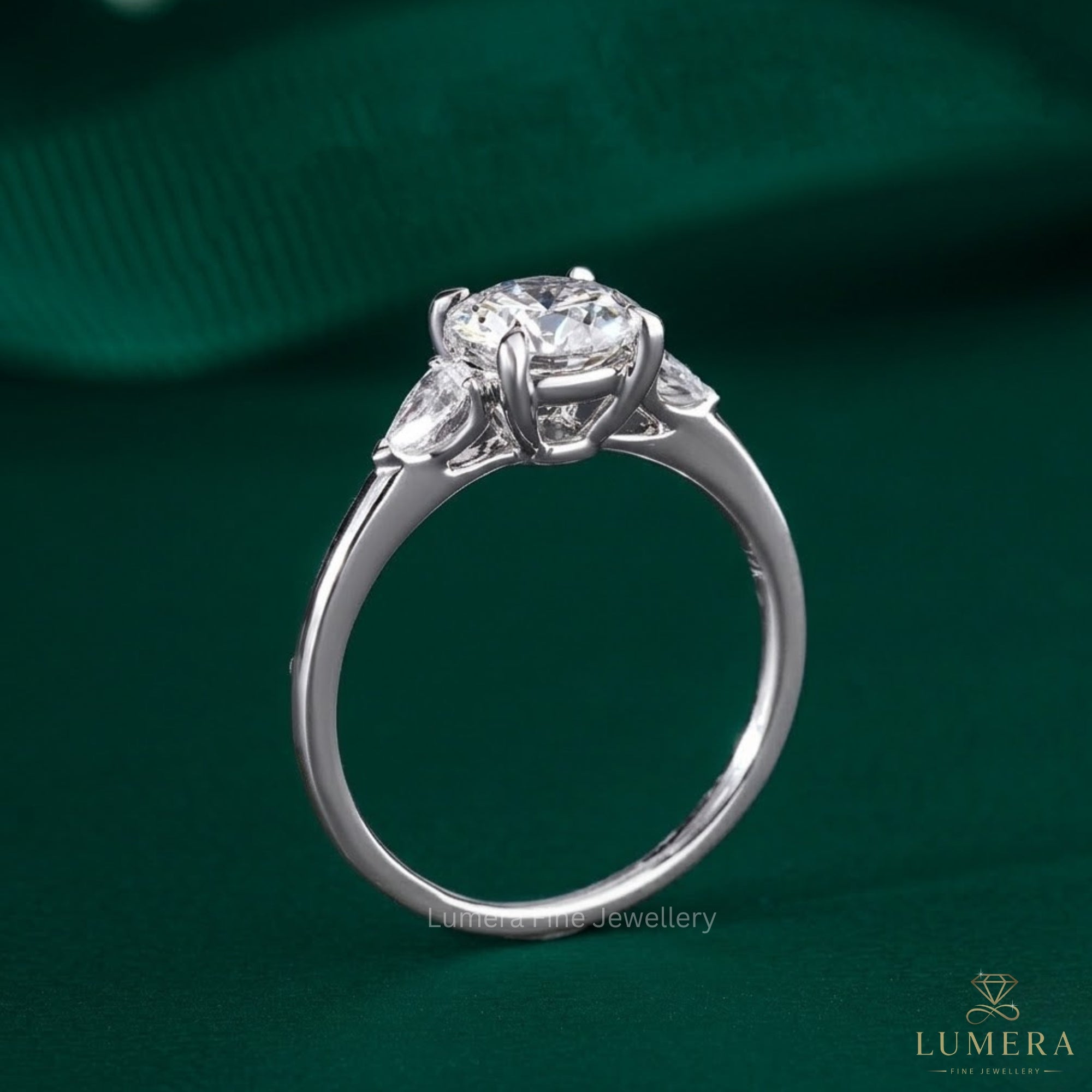 1.00 CT Round Diamond Three-Stone Ring with Pear Side Stones